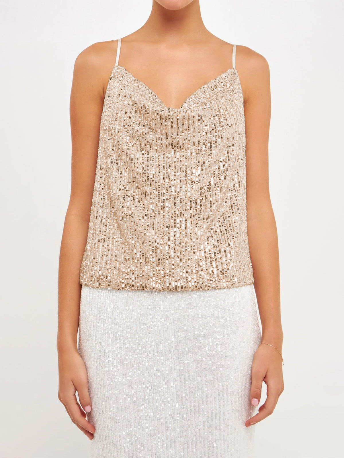 Débardeur sequin tendance 2024 doré à fines bretelles pour un look élégant et festif