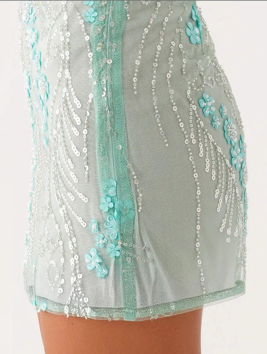 Jupe style Stockholm soirée avec broderies turquoises et sequins brillants pour une soirée élégante