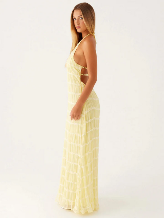 Robe élégante soirée jaune longue fluide à dos nu parfaite pour événements chic