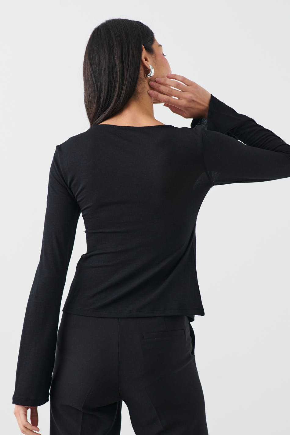 T-shirt style Stockholm pour femme noir à manches longues vu de dos par My Store