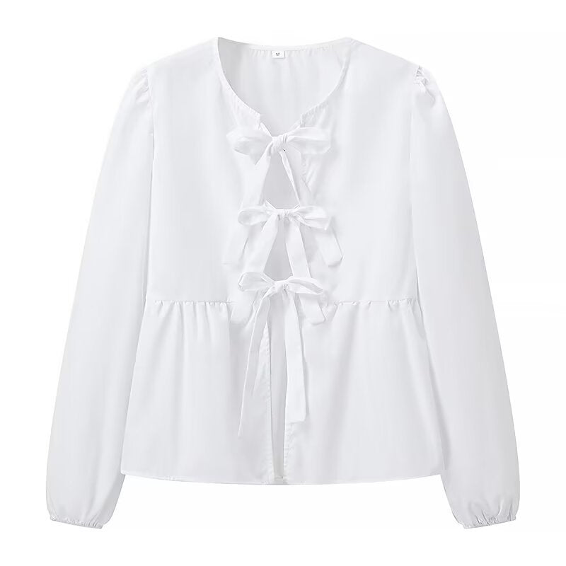 Top blanc clean girl tendance à manches longues avec nœuds décoratifs sur le devant
