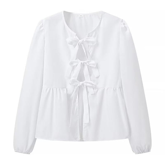 Top blanc clean girl tendance à manches longues avec nœuds décoratifs sur le devant